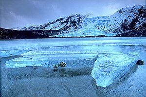 Gígjökull, an outlet glacier extending from Eyjafjallajökull, Iceland. Lónið is the lake visible in the foreground.