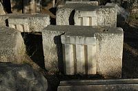 Triglyph blocks with slots for the insertion of metopes in the Marmaria at Delphi.