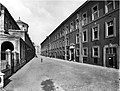 The façade of the Ospedale di San Carlo (on the right) along Borgo Santo Spirito