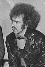 A black-and-white photo of Bernie Leadon.