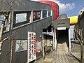 Entrance to the station building from the access road. Note the yellow tube leading to the other entrance.