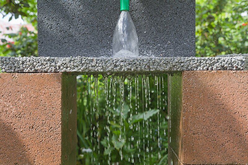 File:Permeable paver demonstration.jpg