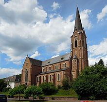 St. Andreas church view from the market place, blue sky and sunny weather