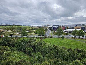 Commercial buildings and Kopupaka Reserve in Westgate