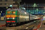 A Russian ЧС8 class electric locomotive leads a passenger train at Rostov in June 2010