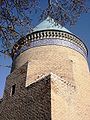 The blue turquoise conical dome of the Mausoleum of Hamdollah Mostowfi "the explorer" in Qazvin