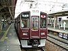 A 9300 series EMU in Hankyu Maroon livery