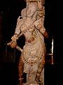 Statue of a musician playing a kinnari vina at the Airakkal Mandapa (Thousand Pillar Hall) in the Meenakshi Temple, Madurai.