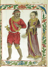 An elaborate border frames a full length illustration of a man and woman. The dark-skinned man dressed in a red tunic, breeches, and bandann with a gold chain is looking over his shoulder in the direction of the woman who, garbed in a dark gold-fringed dress that covers her body except for her bare feet, has the faintest hints of a smile.