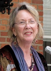 Byer accepting an award from the North Carolina Literary Hall of Fame in 2012