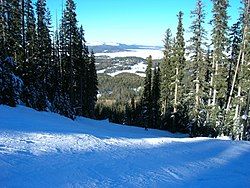 View from mid-mountain Sunrise Peak looking north. Volcanic cinder cones can be seen in the distance.