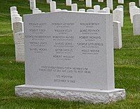 A headstone in a cemetery