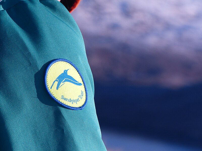 File:Sandpiper Trust Jacket.jpg