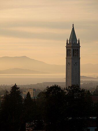 Sather Tower (the Campanile) looking out over the San Francisco Bay with Mount Tamalpais in the distance, from California Memorial Stadium at sunset, 2006.