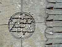 Decaying wood inlay on a chest in a Greek monastery.