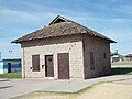 The Old Parker Jail was built in 1914 and located in Pop Harvey City Park. It was listed on the National Register of Historic Places on April 3, 1975, Reference #75000369.