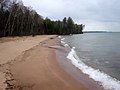 A sandy beach at the Little Sand Bay Visitor Center