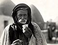 Image 43Syrian Bedouin from a beehive village in Aleppo, Syria, sipping the traditional murra (bitter) coffee, 1930 (from History of coffee)