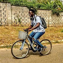 Photograph of someone riding a bicycle