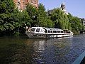 A tour boat passing nearby the Rijksmuseum in Amsterdam