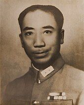 A man in a uniform with medals on his chest