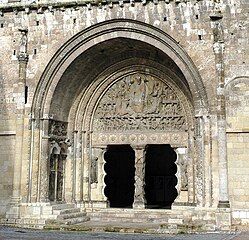 The portal of Saint-Pierre, Moissac, has unusual features including the frieze of roundels on the lintel, the scalloped jambs and figures of prophets on the central jamb