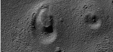 Close view of ring mold crater, as seen by HiRISE under HiWish program. Note: this is an enlargement of the previous image of a field of ring mold craters.