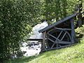 Breastshot water wheel which powered the wood splitting machine in the barn at the farm.