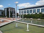 Modern office block c.2000, with water feature in foreground