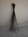 broom made of the stem of coconut leaf