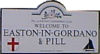 Street sign with the words Welcome to Easton in Gordano & Pill.