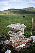 Three large stones removing excess liquid from a cheese, Khövsgöl Province