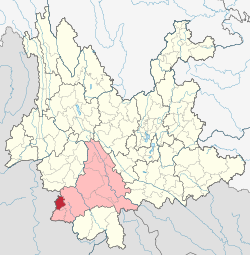 Location of Ximeng County (red) and Pu'er City (pink) within Yunnan