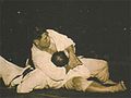 Image 18Masahiko Kimura vs. Hélio Gracie, a 1951 bout between Japanese judo fighter Masahiko Kimura and Brazilian jiu jitsu founder Hélio Gracie in Brazil, was an early high-profile mixed martial arts bout. (from Mixed martial arts)