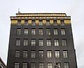 Ideal House in London, a black and gold building