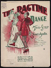 A stereotyped African-American couple are shown dancing in a drawing on the front cover of the sheet music