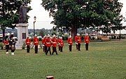 The Royal New Brunswick Regiment's full dress uniform includes a Wolseley helmet with a blue puggaree.