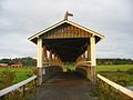 Poukkasilta, a covered bridge over the Loimijoki River in Ypäjä, Finland.