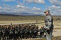 A U.S. military police officer addresses Macedonian and U.S. troops during a safety brief in Macedonia.