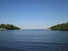 Sudenväylä (also known as Kraaselin kaivanto) boating channel, Haukipudas, Finland. Seen from a vessel approaching from Kuivasmeri bay towards Kellonlahti bay. The island on the left (south) is Kellon Kraaseli, on the island on the right (north) is Rapakari