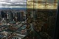 Looking north-east over Melbourne CBD from Skydeck 88, with reflections in the tower's gold plated windows