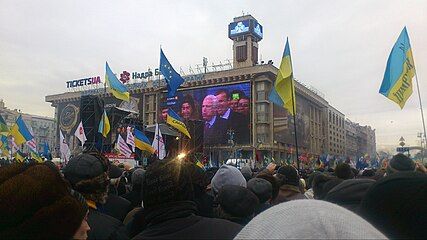 McCain addresses anti-government protesters in Kyiv, Ukraine, pledging his support for their cause on 15 December 2013.