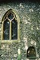 The south side of the chancel, showing a blocked aperture through which an anchorite would once have received the Blessed Sacrament