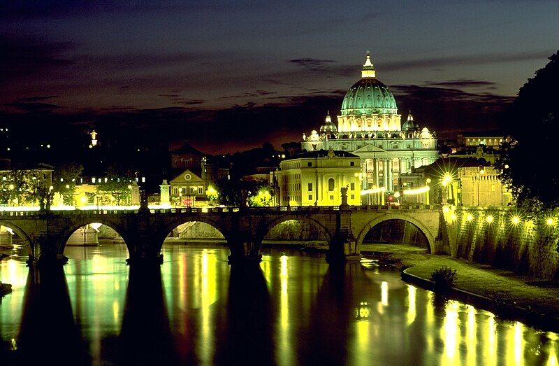 File:AngelsBridgeAndBasilicaDiSanPietroAtNight.jpg