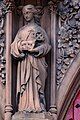 Statue carved from red sandstone on Grayfriars Church, Dumfries