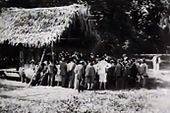 Maya monument in Quiriguá; note how everybody is dress in formal attire and women are wearing skirts and heels.