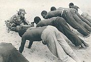 A Rhodesian soldier questioning villagers near the border of Botswana in the fall of 1977. Taken for Associated Press. First of three photos that were awarded a 1978 Pulitzer Prize.