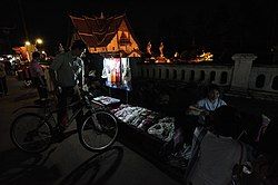 A local street vendor by the Wat Phumin at night