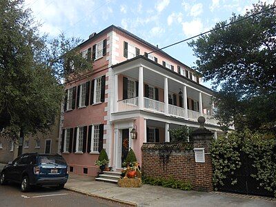 The Charles Graves House at 123 Tradd Street, Charleston, South Carolina is a classic example of a single house, with its narrow end facing the street, a false front door screen a piazza, and a true front door halfway along the longer side of the house