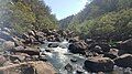 The rocky rapids of Nepean River flowing into the Basin (south side)